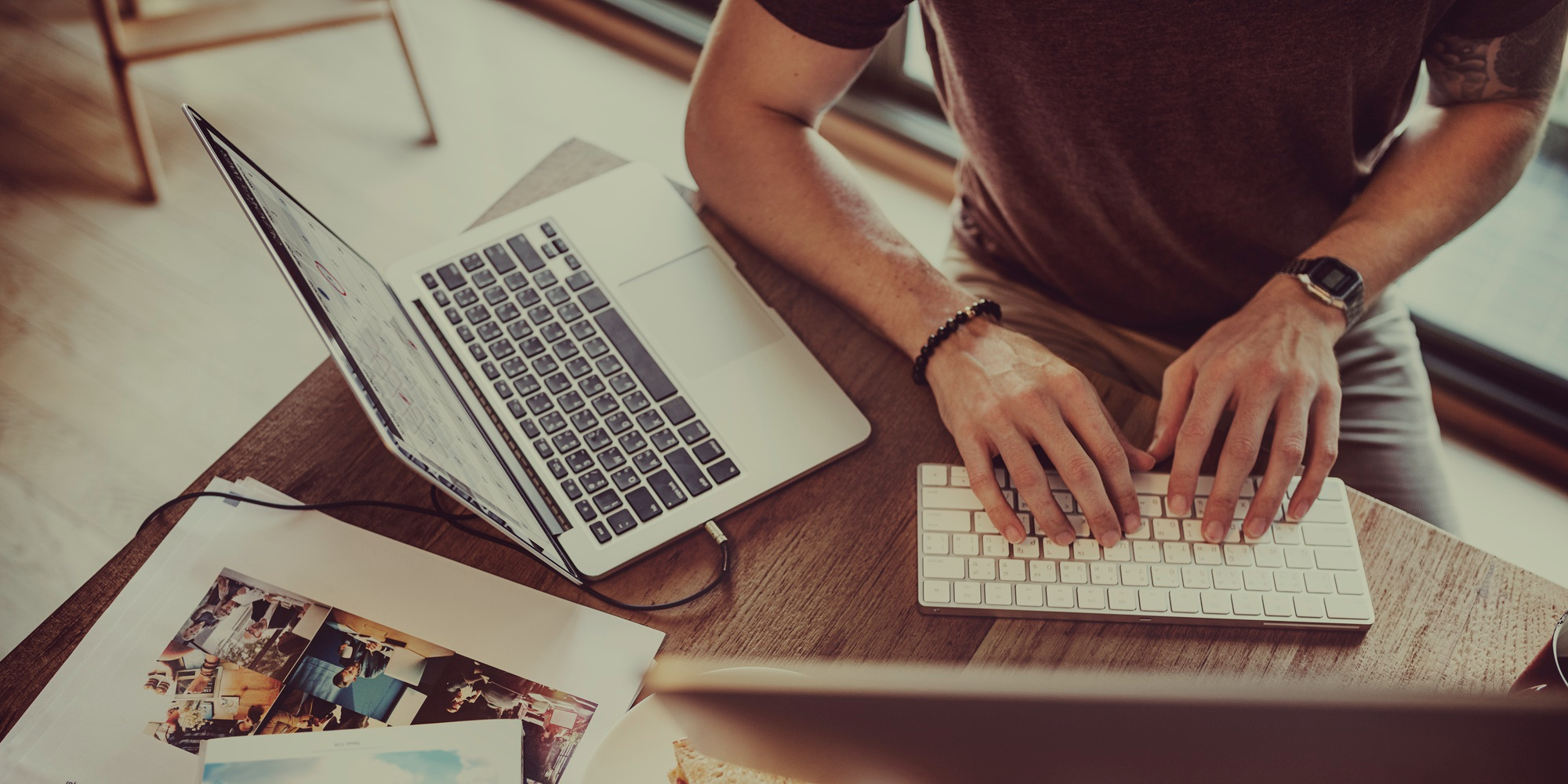 Man working at computer providing small business IT support and solutions